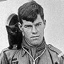 Scout Marr with 'Questie', ca 1922, ship's cat on Quest during Shackleton's last voyage - click to enlarge