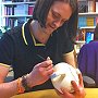 James Bowen signing the teapot auctioned on eBay in support of Blue Cross, May 2013