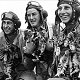Six kittens from Cressy airbase, Australia, with pilots, 1943 - click to enlarge