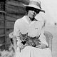 Suez Canal Zone, late 1918, a Mrs Chisholm and cat - click to enlarge
