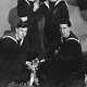 HMS Belfast sailors and ship's cat, 1942 (copyright IWM, used with permission) - click to enlarge
