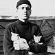 Snow and Mouse, ship's cats of SS Jupiter, with J E Hall, ca 1917