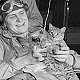 Pilots entertain unnamed ship's cat aboard USS Ranger, 1944