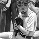 Kitten 'Salvo' and puppy 'Shrapnel' and owners, HMAS Sydney, July 1940 - click to enlarge