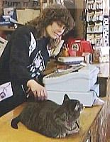 Tom on the shop counter, Conrad, Iowa