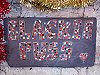 Mosaic tribute to Blackie Puss, late of The Nag's Head, Walthamstow, Greater London